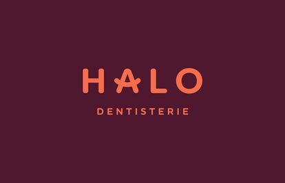 Logo for Halo Dentistry, a dental clinic. The logo features the word “HALO” in orange on a dark purple background, with an asterisk in place of the “A”. The word “DENTISTERIE” is written below it in smaller size, also in orange.