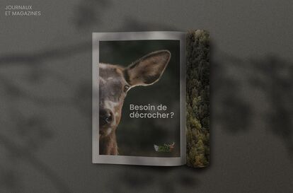 Une publicité pour le Parc Oméga avec l'image d'un jeune cerf qui regarde le spectateur. Le texte dit 